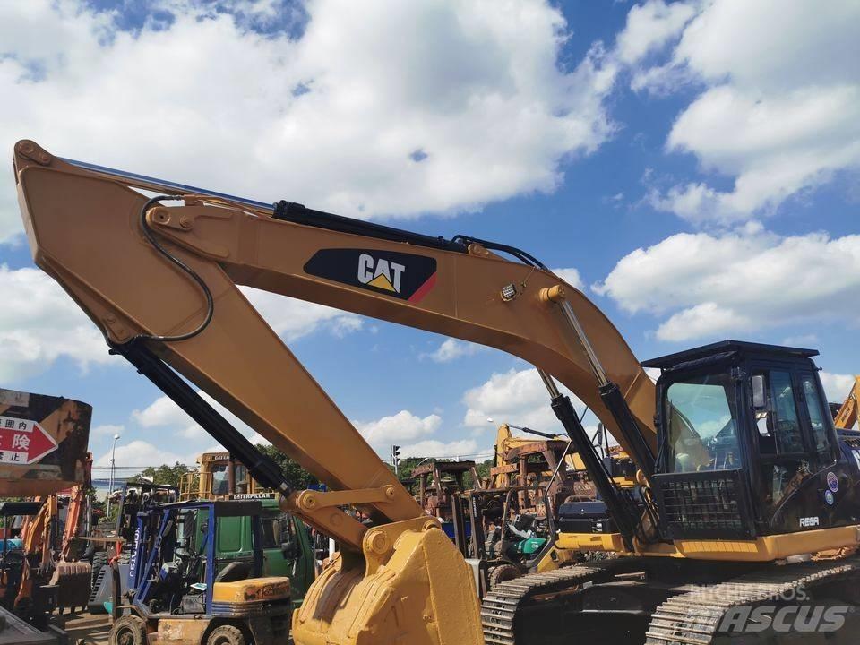 CAT 330DL Гусеничні екскаватори