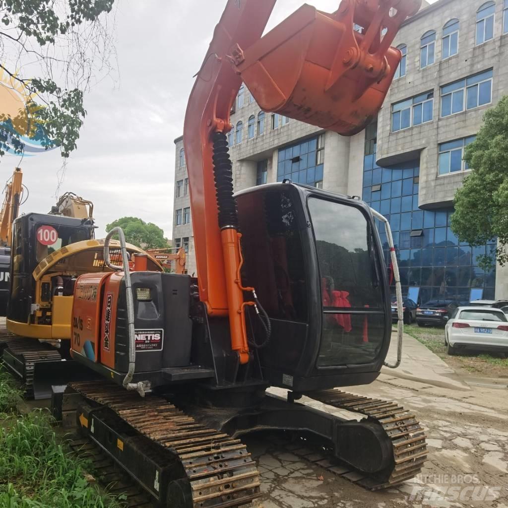 Hitachi ZX 70 Міні-екскаватори < 7т