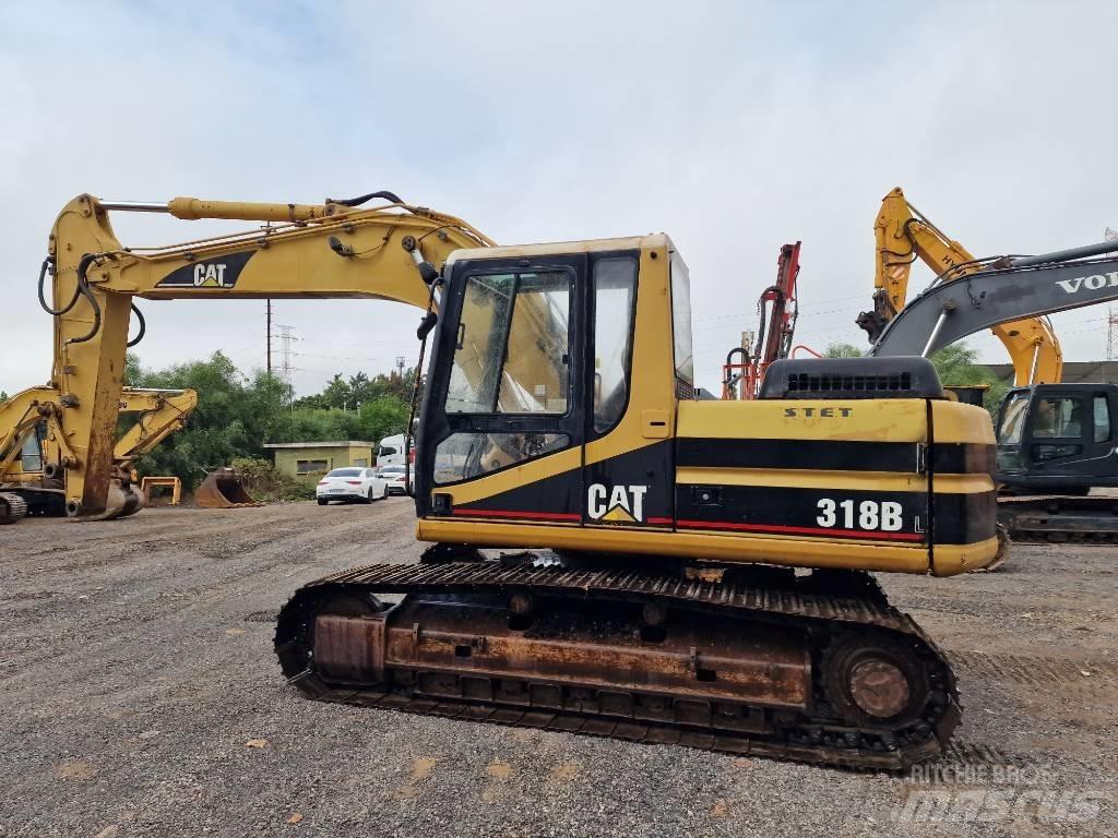CAT 318 B L Гусеничні екскаватори