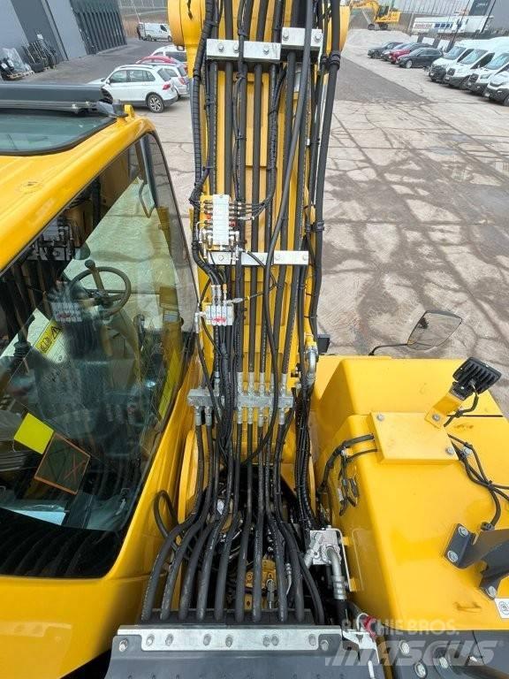 Komatsu PW160-11 Колісні екскаватори