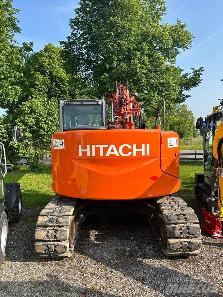 Hitachi ZX 135 US-3 Гусеничні екскаватори