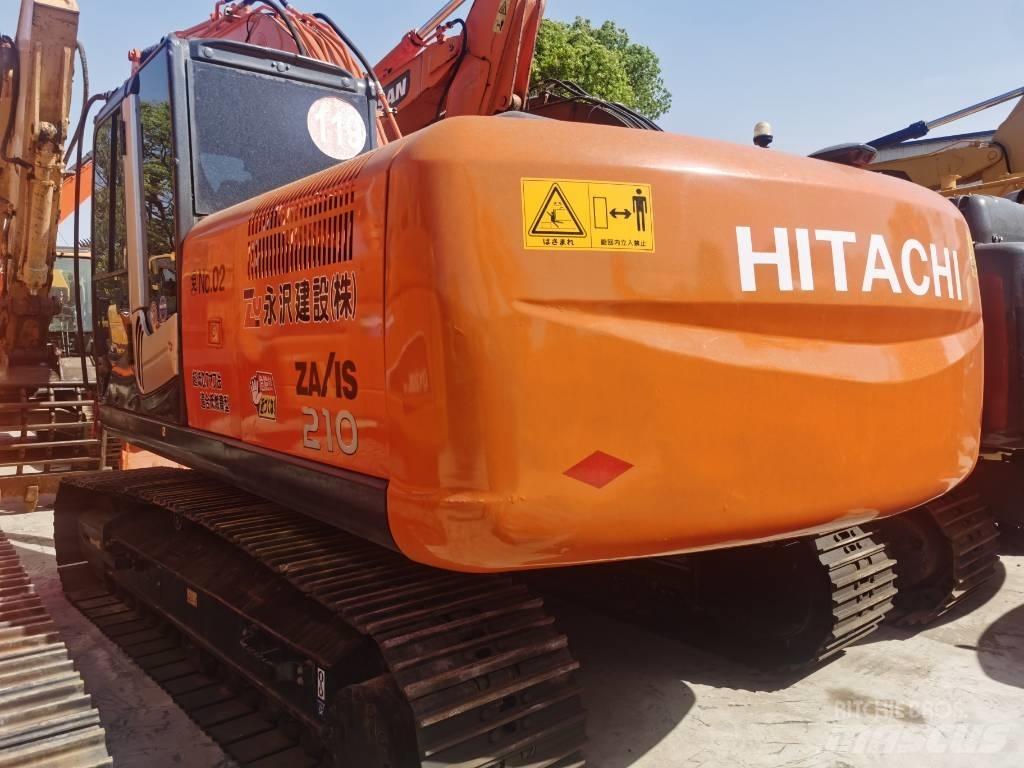 Hitachi ZX 210 Гусеничні екскаватори