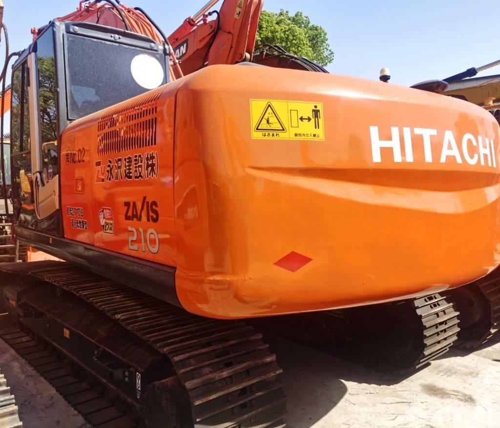 Hitachi ZX 210 Гусеничні екскаватори