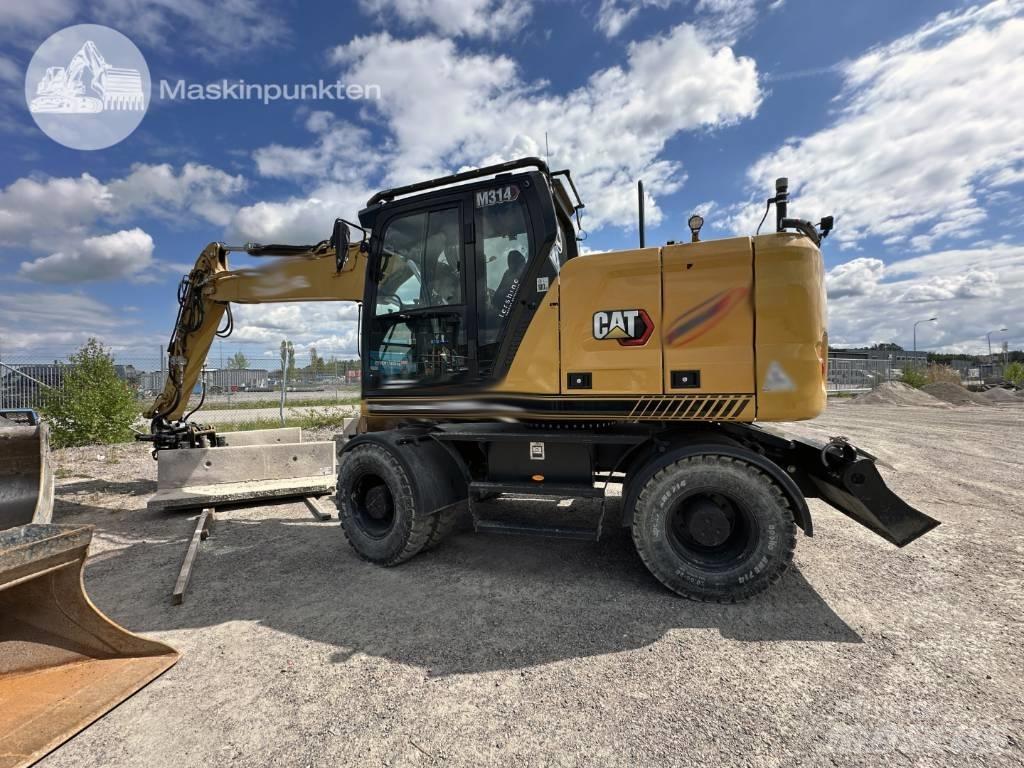 CAT M 314 Колісні екскаватори