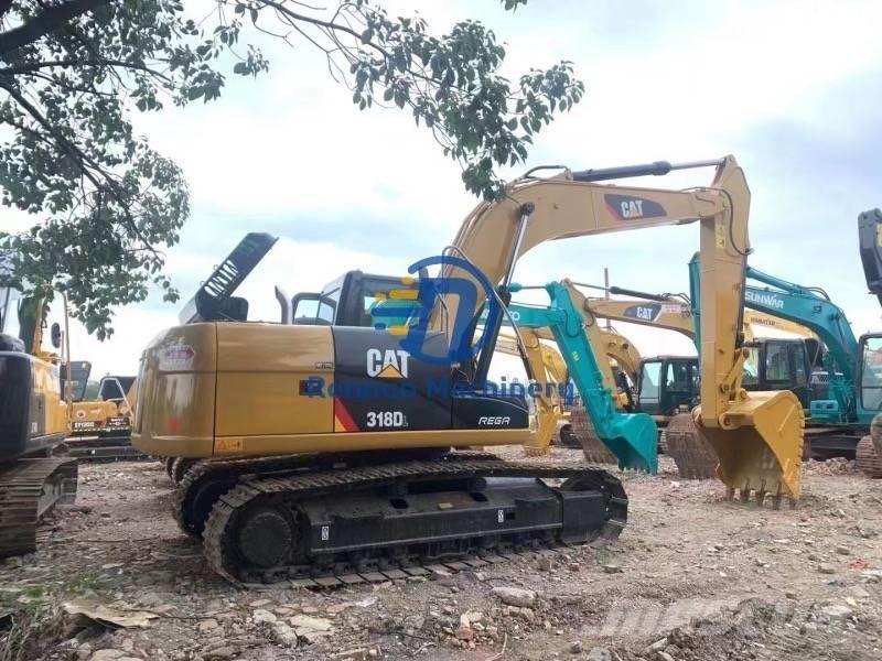 CAT 318DL Гусеничні екскаватори