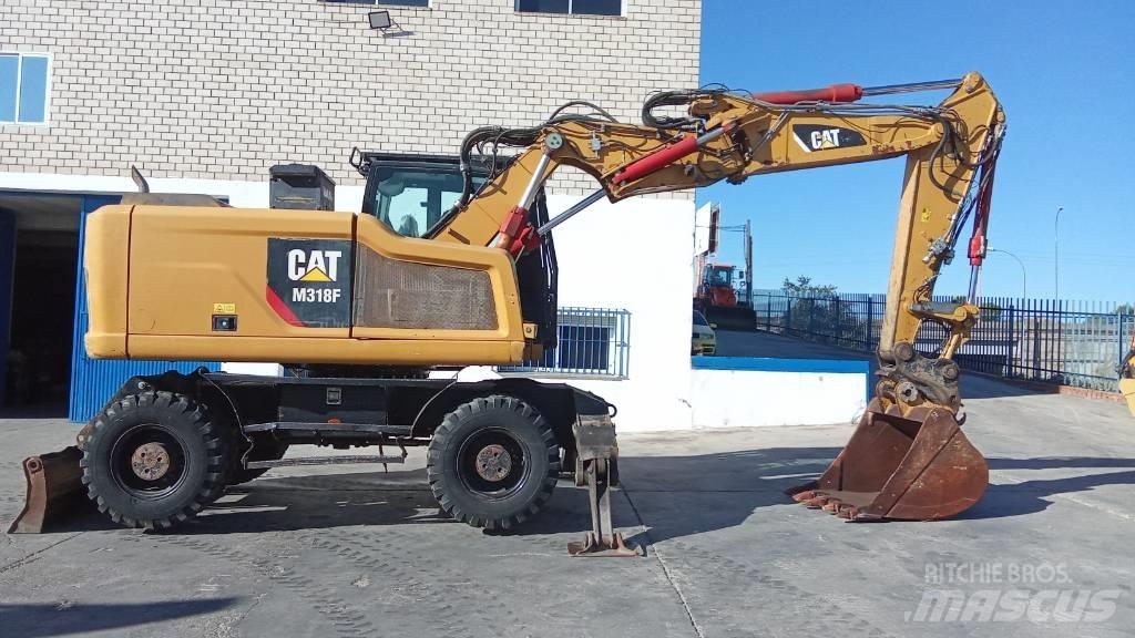 CAT M318F Колісні екскаватори