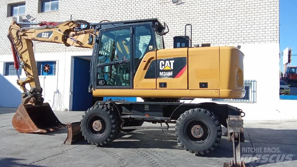 CAT M318F Колісні екскаватори
