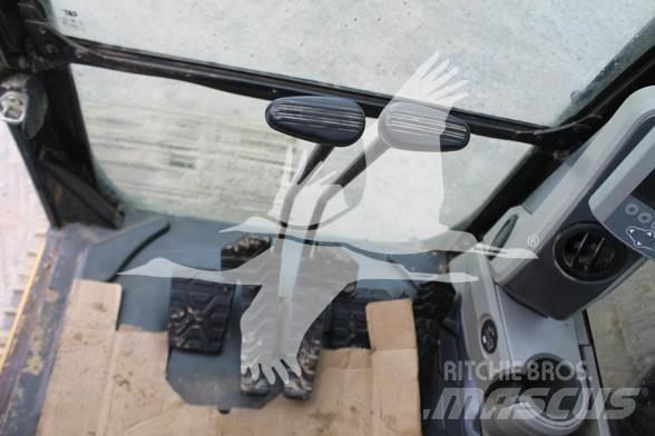 CAT 323FL Гусеничні екскаватори