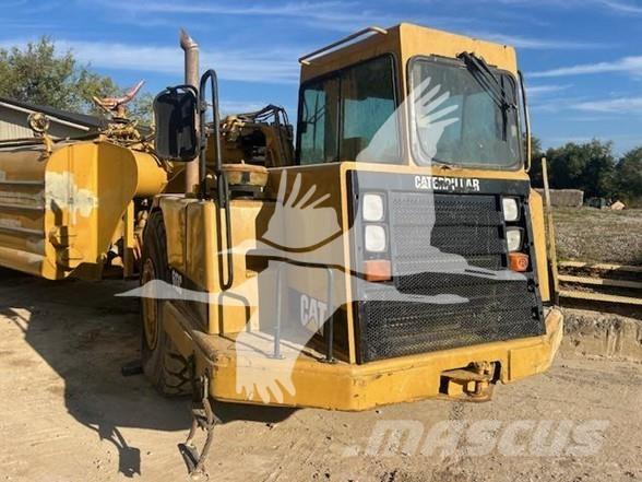 CAT 613C Поливальні машини