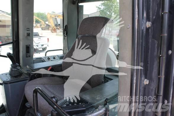 CAT 953C Гусеничні вантажники