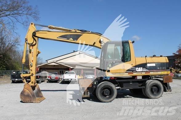 CAT M318C Колісні екскаватори