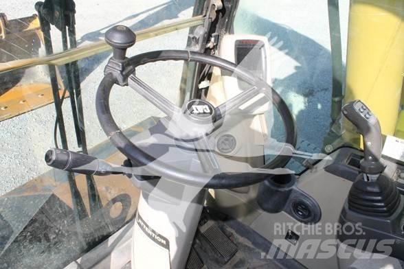 CAT M318C Колісні екскаватори