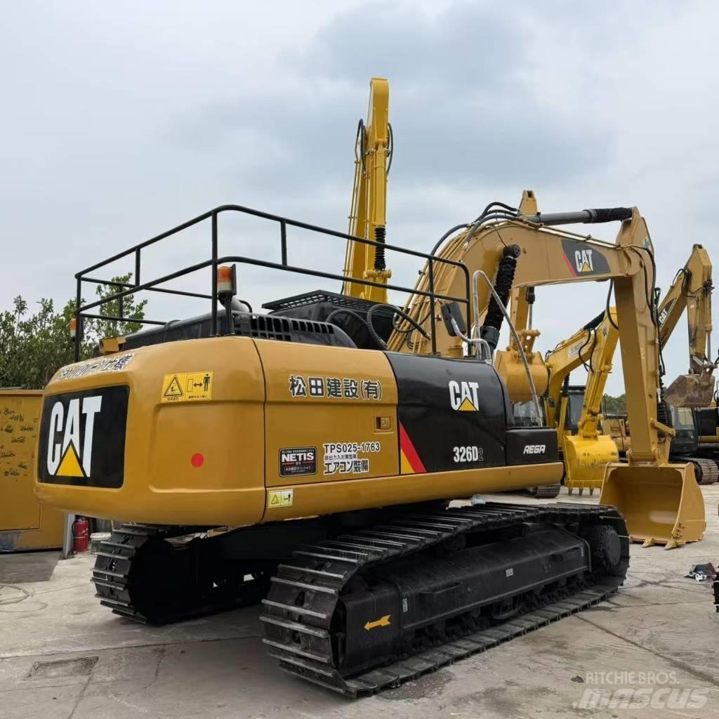 CAT 326D2 Середні екскаватори 7т. - 12т.