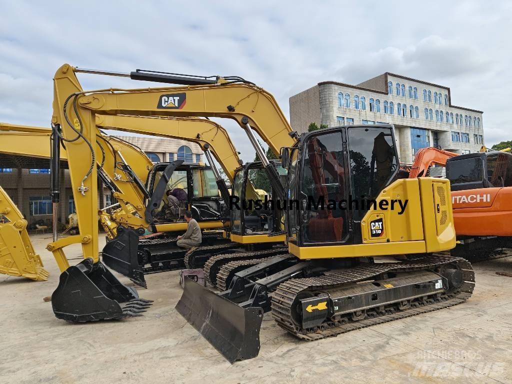 CAT 310 Гусеничні екскаватори