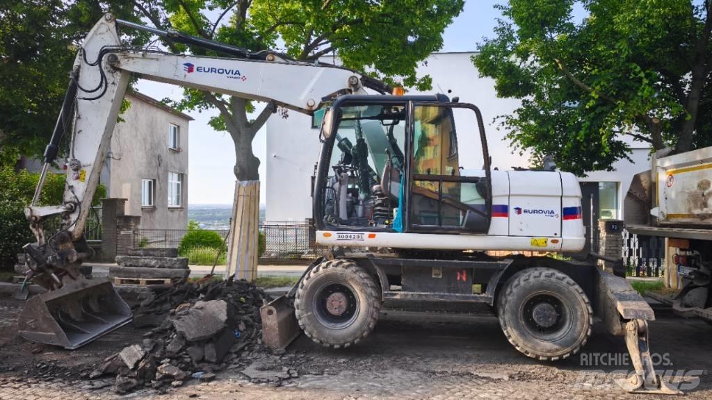 CAT 313 D Колісні екскаватори