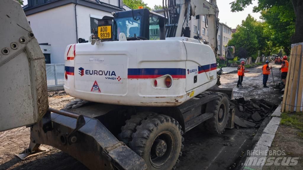 CAT 313 D Колісні екскаватори