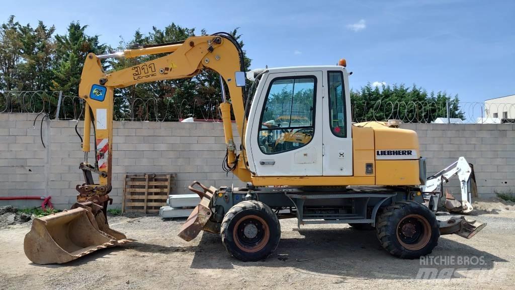 Liebherr A 311 Колісні екскаватори