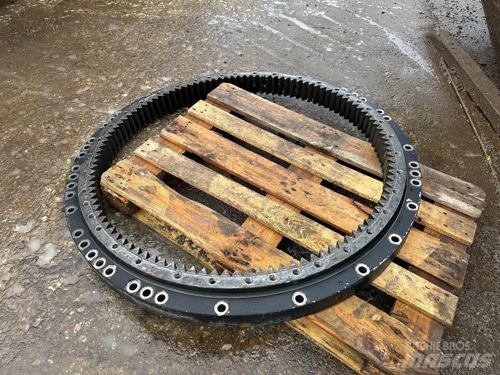 CAT 323 slew ring Осі