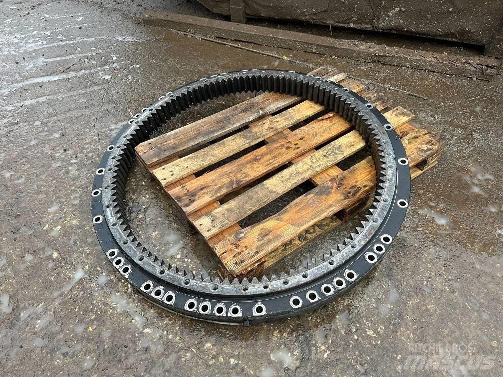 CAT 323 slew ring Осі