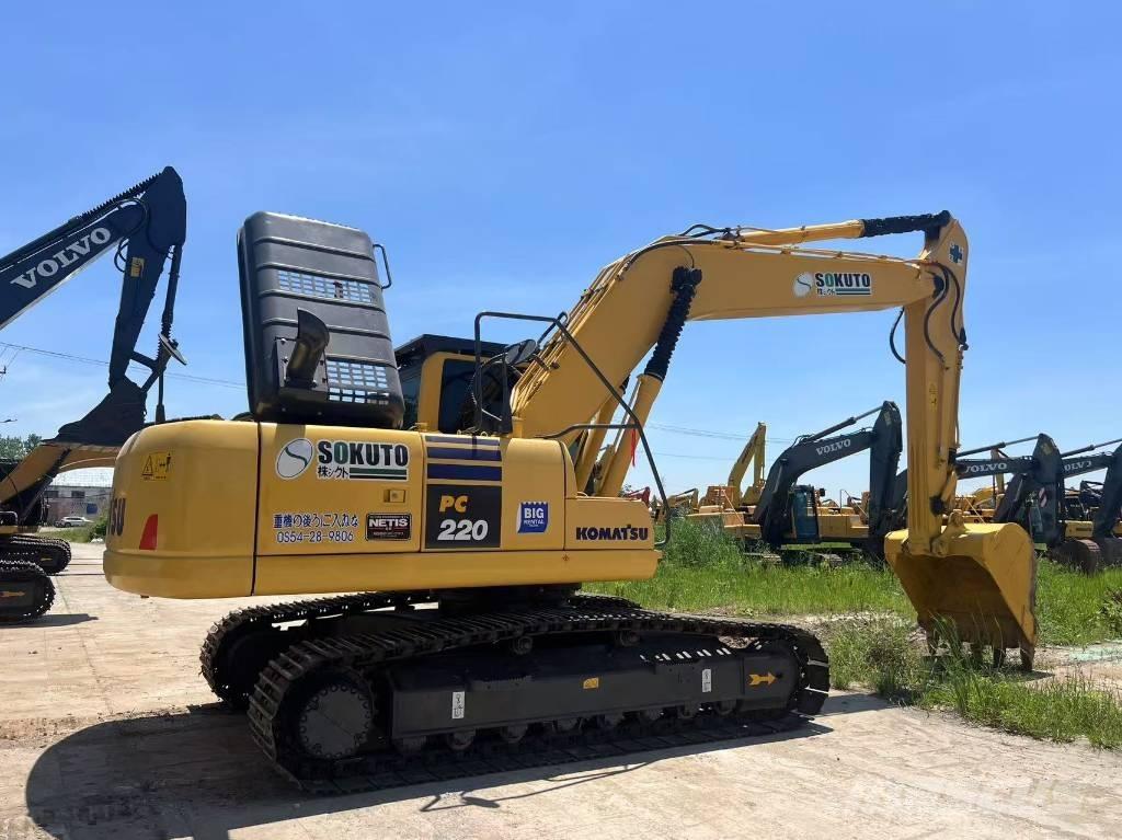 Komatsu 220 Гусеничні екскаватори