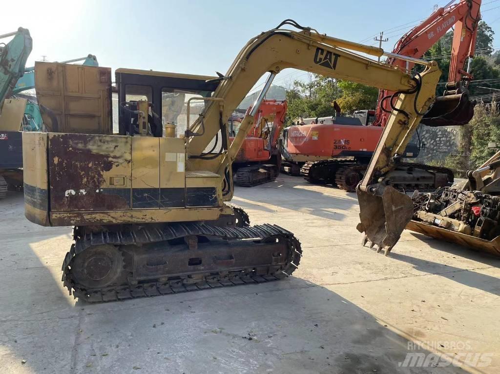 CAT E 70 B Гусеничні екскаватори