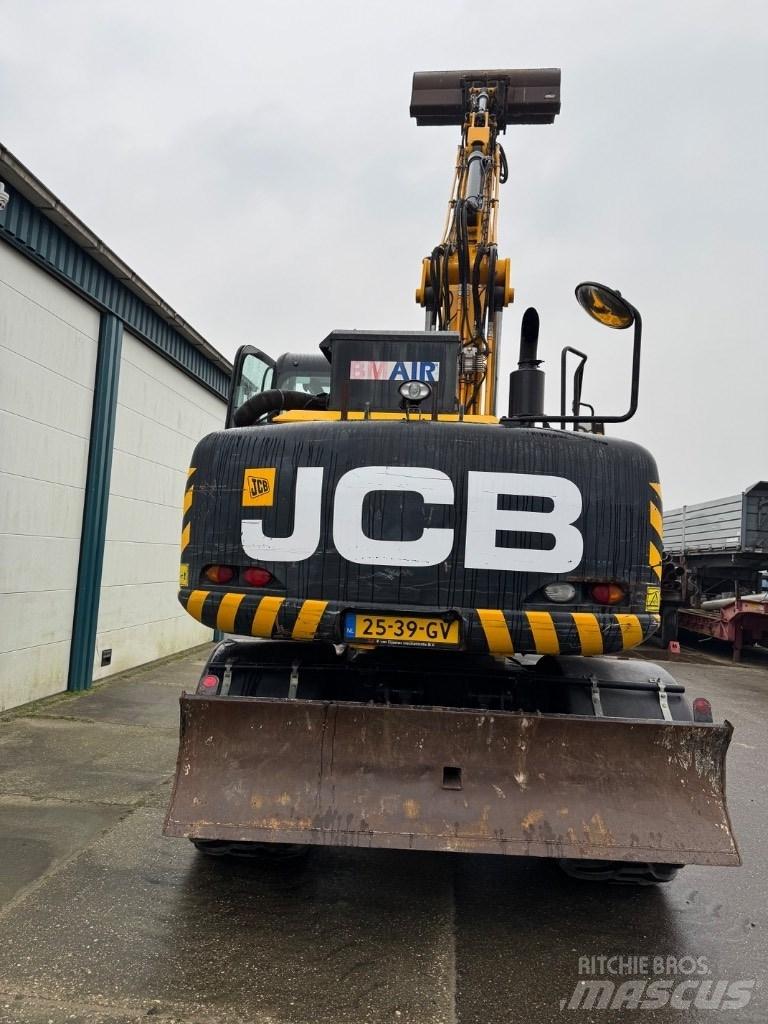 JCB 140w Гусеничні екскаватори