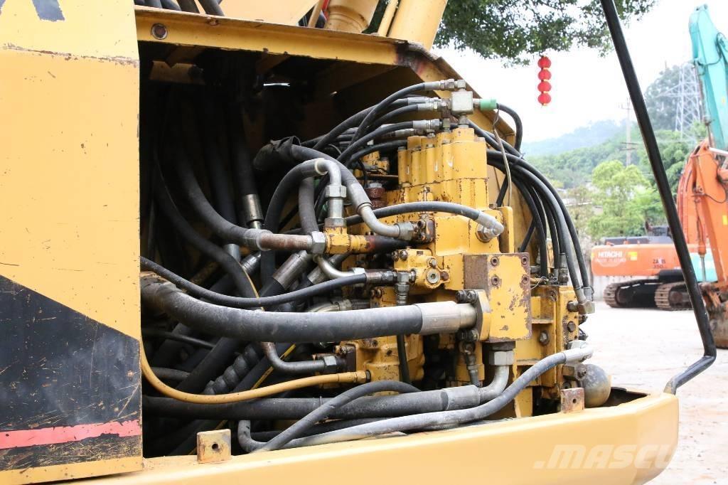 CAT 320BU Гусеничні екскаватори