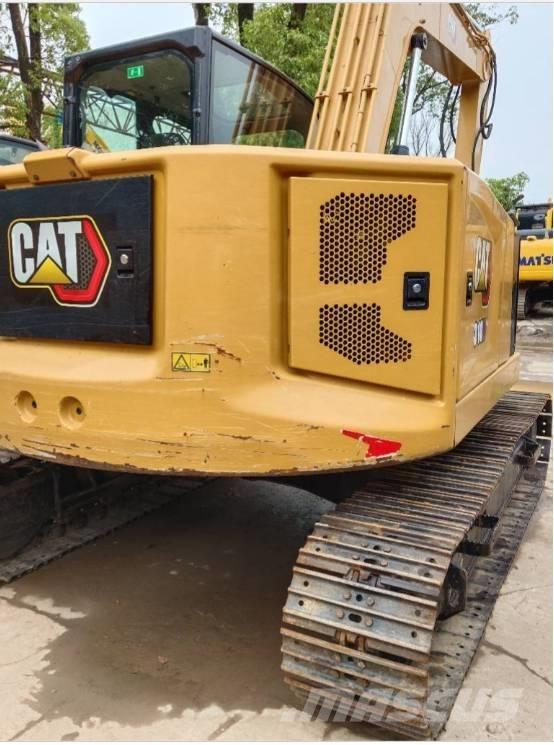 CAT 310 Гусеничні екскаватори