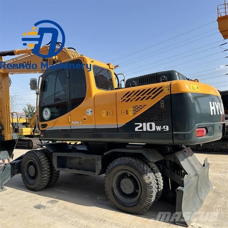 Hyundai 210W-9 Колісні екскаватори