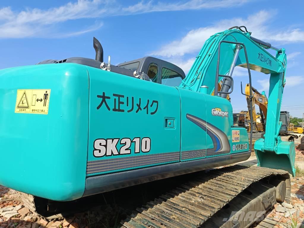 Kobelco SK 210 Гусеничні екскаватори
