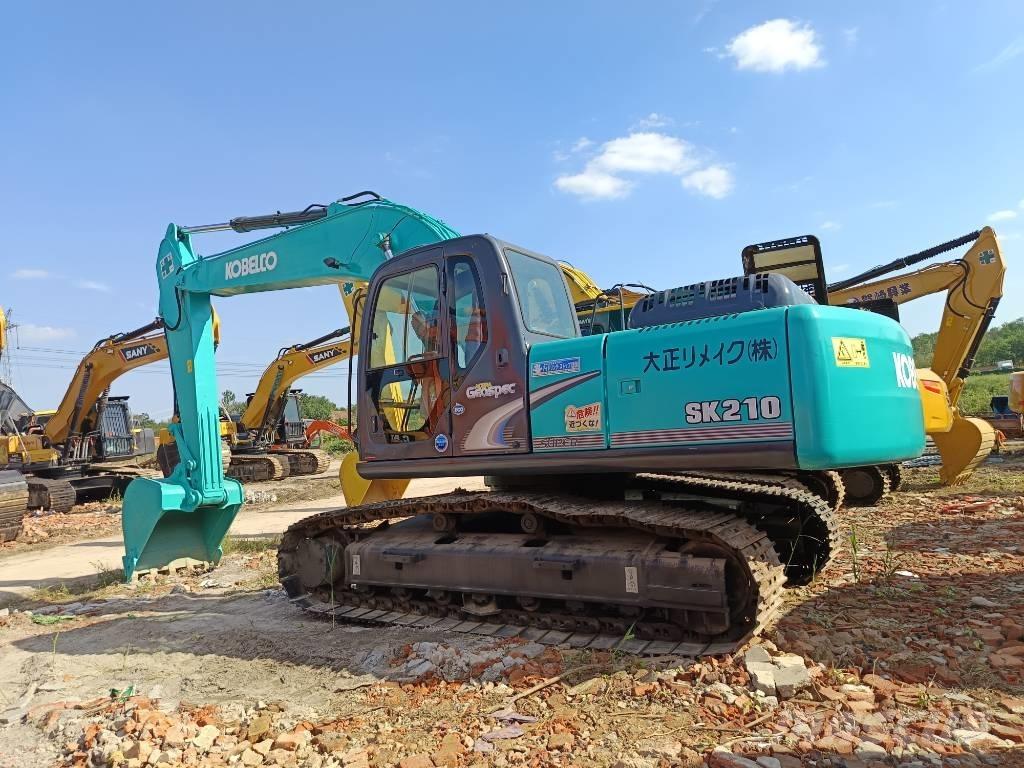 Kobelco SK 210 Гусеничні екскаватори