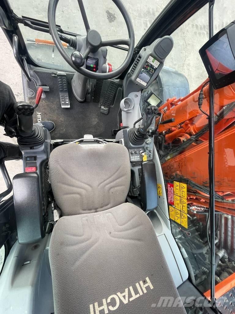 Hitachi 140W Колісні екскаватори