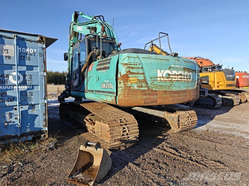 Kobelco SK210 Гусеничні екскаватори