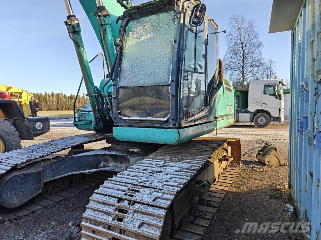 Kobelco SK210 Гусеничні екскаватори