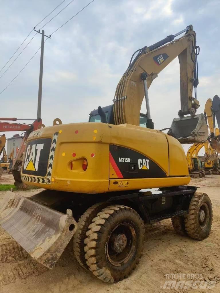 CAT M315D2 Гусеничні екскаватори