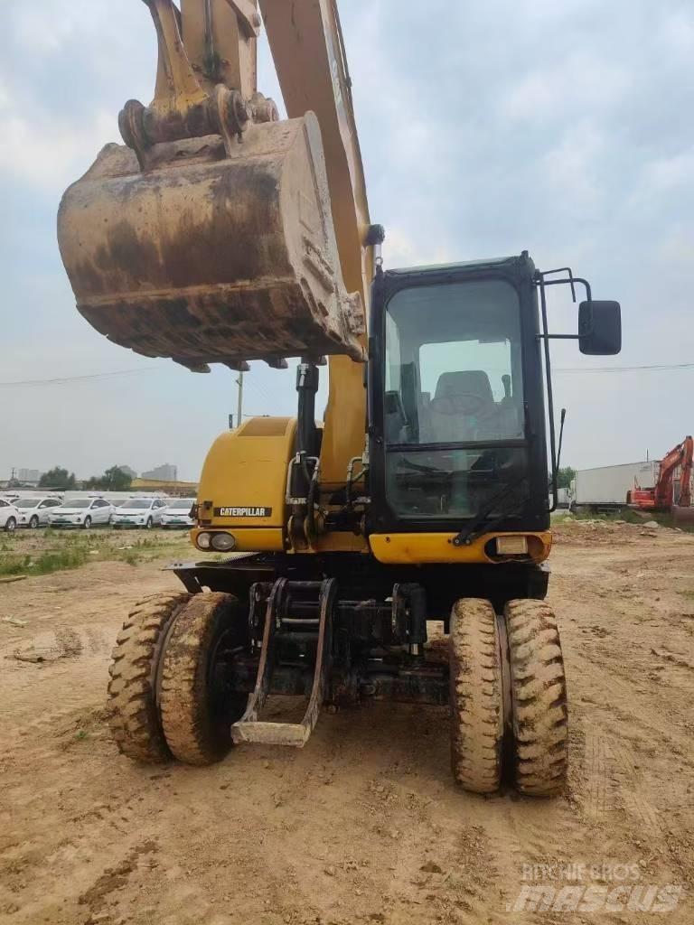 CAT M315D2 Гусеничні екскаватори
