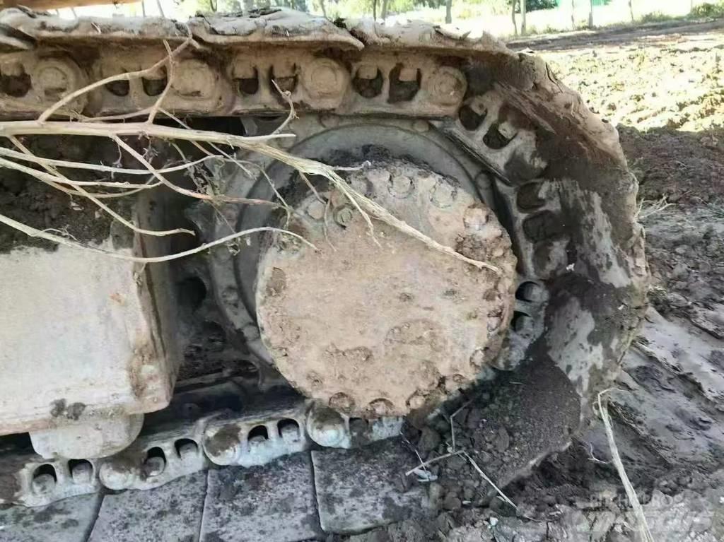 Komatsu PC 210 Гусеничні екскаватори
