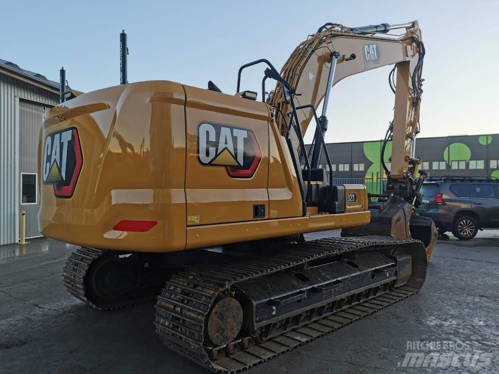 CAT 323 Гусеничні екскаватори