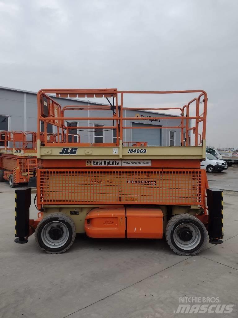 JLG M 4069 Підйомники-ножиці