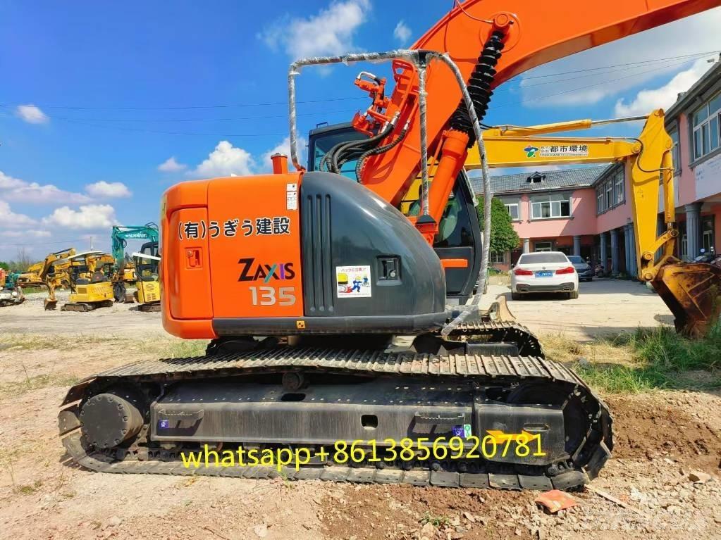 Hitachi ZX 135 US Гусеничні екскаватори