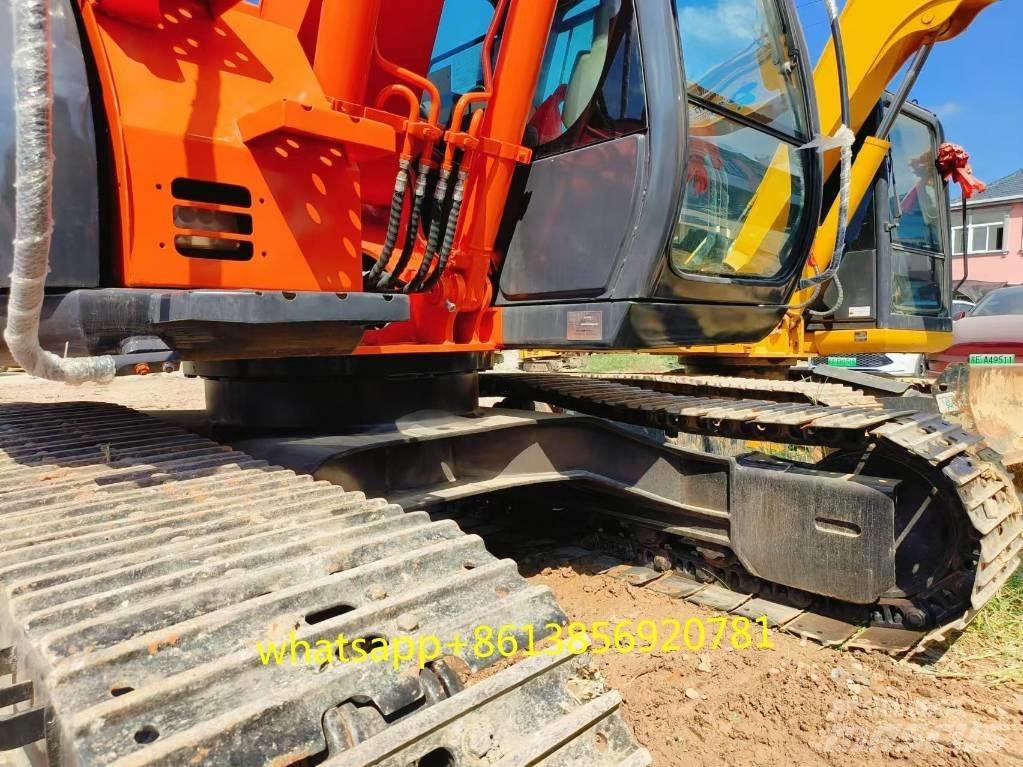Hitachi ZX 135 US Гусеничні екскаватори