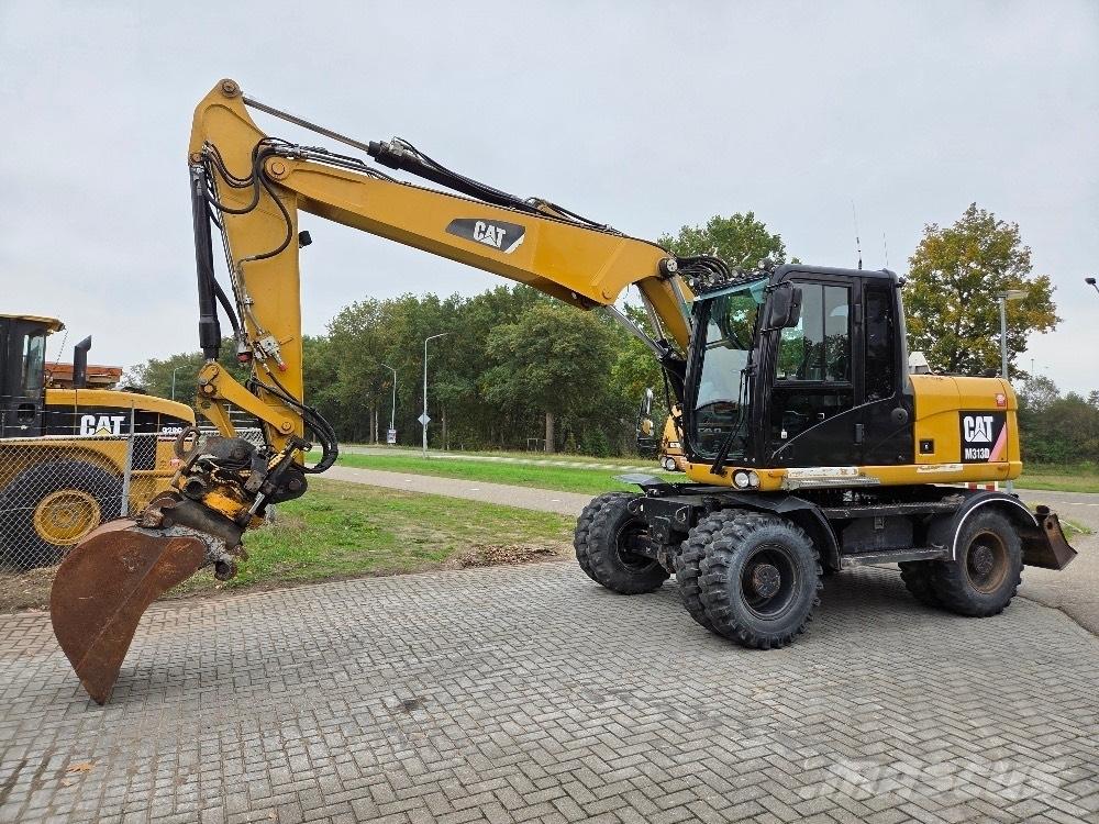 CAT M313D Колісні екскаватори
