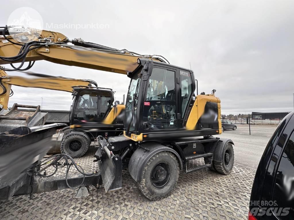 CAT M 315 Колісні екскаватори
