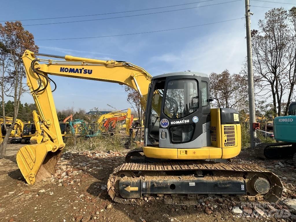 Komatsu PC 128 US Гусеничні екскаватори