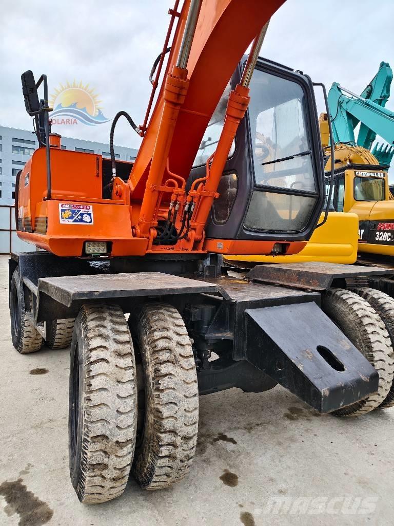 Hitachi EX 100 W D Колісні екскаватори