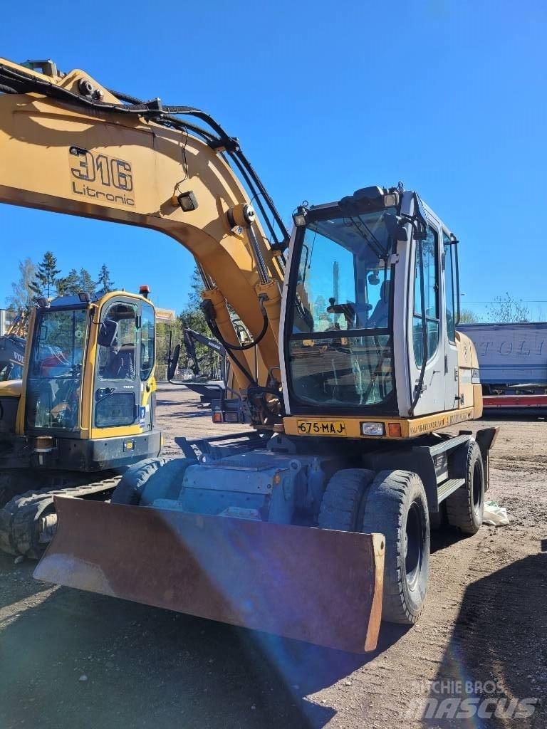 Liebherr 316 Колісні екскаватори