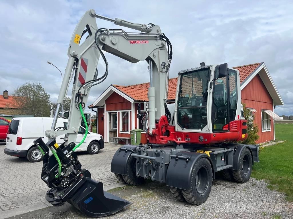 Takeuchi TB 395 W Колісні екскаватори