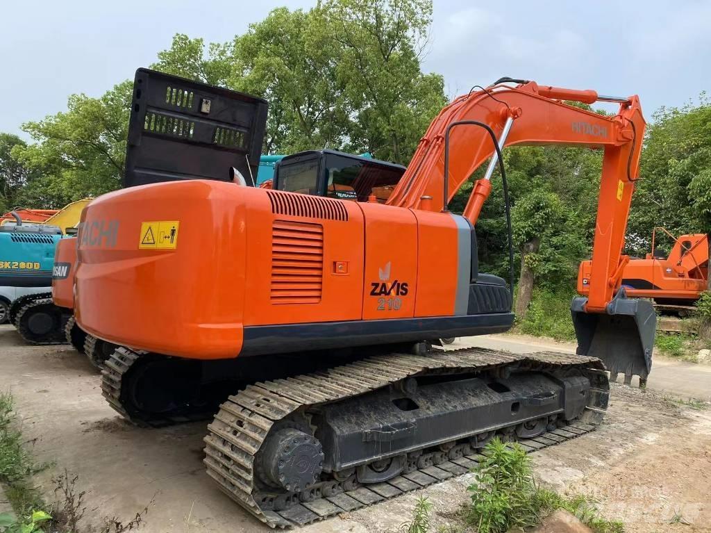 Hitachi ZX 210 Гусеничні екскаватори