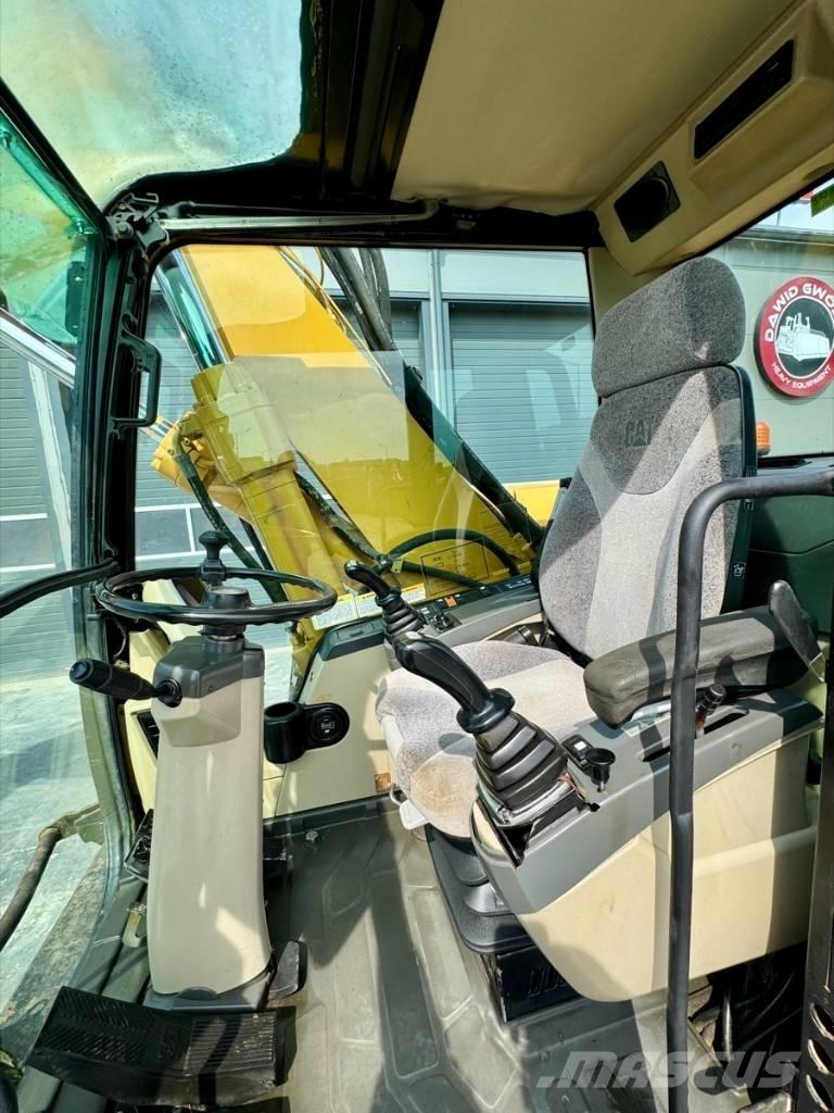 CAT M 318 C Колісні екскаватори