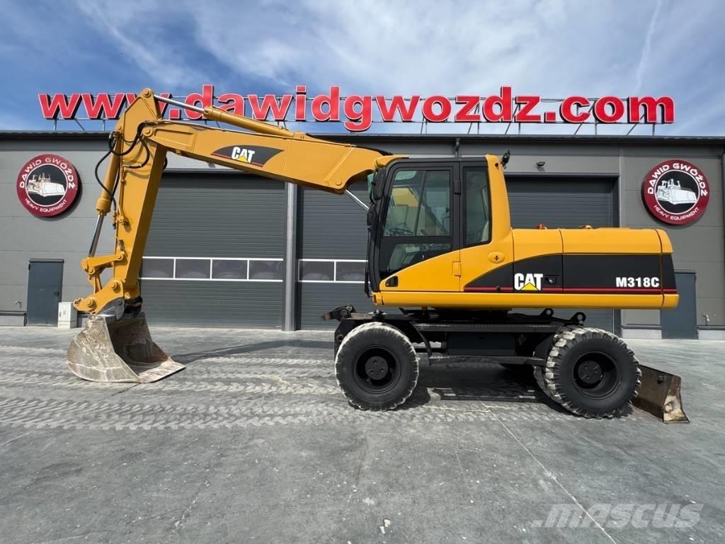 CAT M 318 C Колісні екскаватори
